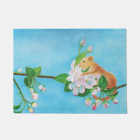 Hazel Dormouse on a blooming branch 