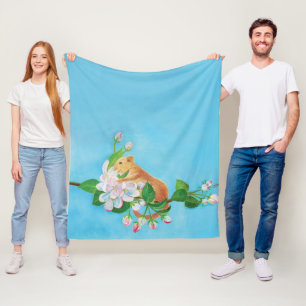   Hazel Dormouse on blooming branch of apple tree  Fleece Blanket
