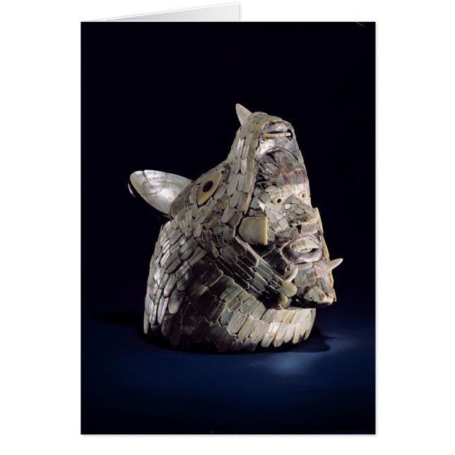 Head of an animal with human head in open jaws (Front)
