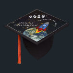 Headed for the Stars  Graduation Cap Topper<br><div class="desc">Grad cap topper that anticipates a bright future ahead. The design features a rocket headed away from earth, journeying into the galaxy. Symbolic of a graduate's hoped-for future. All text is easy changed with the template. Selecting “Personalize this design” offers you several edit options to easily change the text (wording,...</div>