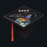 Headed for the Stars Graduation Cap Topper<br><div class="desc">Grad cap topper that anticipates a bright future ahead. The design features a rocket headed away from earth, journeying into the galaxy. Symbolic of a graduate's hoped-for future. All text is easy changed with the template. Selecting “Personalize this design” offers you several edit options to easily change the text (wording,...</div>