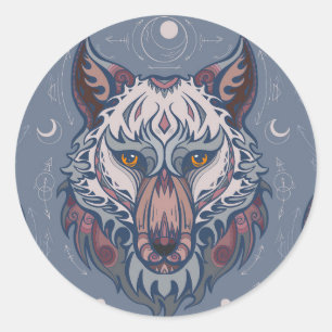 Heads of wolves with boho decoration classic round sticker