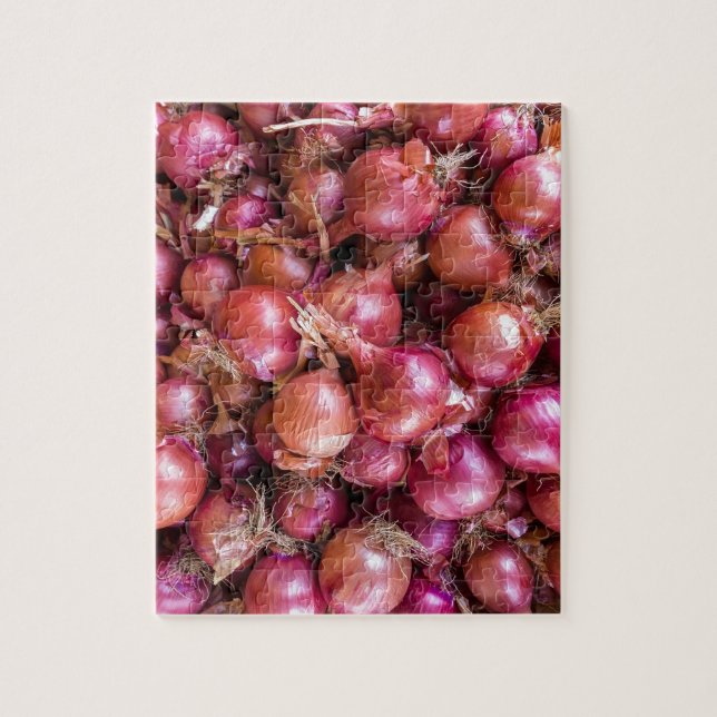 Heap of red onions on market jigsaw puzzle (Vertical)