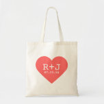 Heart Monogram Wedding Favour Tote Bag<br><div class="desc">Cute girly bold graphy modern heart shape design with the bride and groom's personalized monogram initials and custom wedding date. Perfect for wedding favour tote bags, Valentine's Day, anniversary gift or any occasion! Click the "Customize It" button to add your own custom text and change fonts and colours for a...</div>