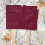 Heart Script Burgundy And Gold Wedding Program Hand Fan<br><div class="desc">An elegant burgundy and gold wedding program featuring chic modern heart script typography. This stylish wedding program can be personalized with your special wedding day information. Designed by Thisisnotme©</div>