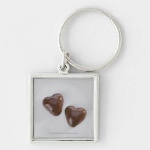 Heart shaped chocolate candies on a plate keychain
