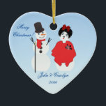 Heart Shaped Snowman Couple Christmas Ceramic Ornament<br><div class="desc">Heart Shaped Snowman & Woman Dressed To Party Christmas Ornament for couples,  newlyweds and special couples.  Snowman and woman drawing by Claudine Boerner with some accents released under CC0 license.</div>