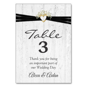 Heart with Black Ribbon On Whitewashed Wood Table Number