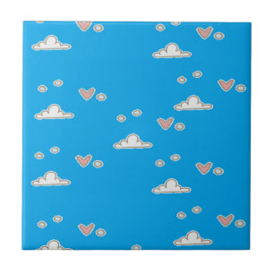 Hearts and clouds on blue tile