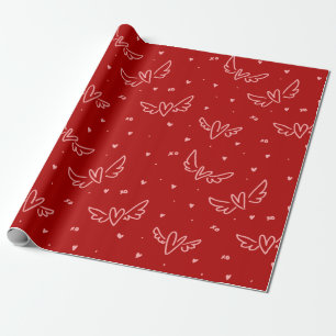 Hearts and wings on red wrapping paper