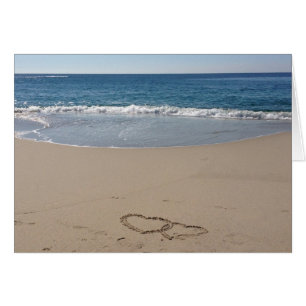 Hearts Together in the Sand