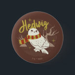 Hedwig Whimsical Forest Drawing 2 Inch Round Button<br><div class="desc">Show your house spirit in the coziest way with this charming Hedwig™ design. Featuring the beloved snowy owl bundled up in a warm Gryffindor house-colored scarf, this playful illustration captures the magic and loyalty of Harry Potter’s trusted companion. Set against a whimsical woodland backdrop with subtle sparkling accents, the hand-drawn...</div>