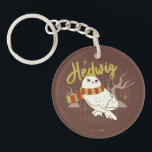 Hedwig Whimsical Forest Drawing Keychain<br><div class="desc">Show your house spirit in the coziest way with this charming Hedwig™ design. Featuring the beloved snowy owl bundled up in a warm Gryffindor house-colored scarf, this playful illustration captures the magic and loyalty of Harry Potter’s trusted companion. Set against a whimsical woodland backdrop with subtle sparkling accents, the hand-drawn...</div>