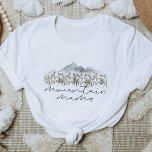 HEIDI Bohemian Colourful Wildflower Mountain Mama T-Shirt<br><div class="desc">This t shirt features smoky watercolor mountains and colourful wildflowers with the words 'mountain mama' written in a boho handwritten script font. This mom shirt is the perfect gift for your favourite expecting mama or works as a great pregnancy announcement idea.</div>