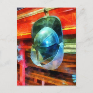 Helmet Hanging on Fire Truck Postcard
