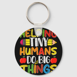 Helping tiny humans do big things cute teacher Hel Keychain