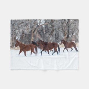 Herd of Horses Running in Winters Snow Fleece Blanket
