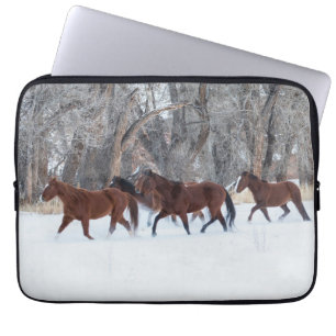 Herd of Horses Running in Winters Snow Laptop Sleeve
