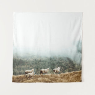 HERD OF SHEEP ON BROWN GRASS FIELD DURING DAYTIME TAPESTRY