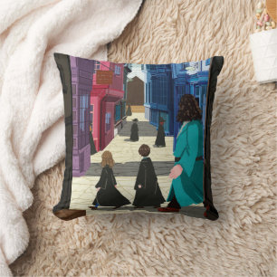 Hermione, HARRY POTTER™, & Hagrid in Diagon Alley Throw Pillow