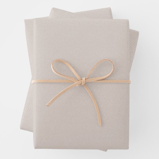 Herringbone tweed effect neutral beige holiday wrapping paper sheet (In situ)