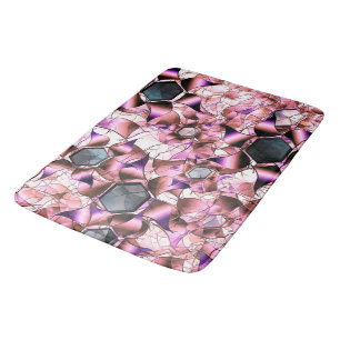 Hexagons surrounded by pinkish petal-like shapes bath mat
