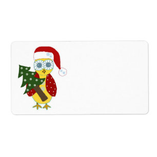 Hibou avec un chapeau de Père Noël et un arbre de
