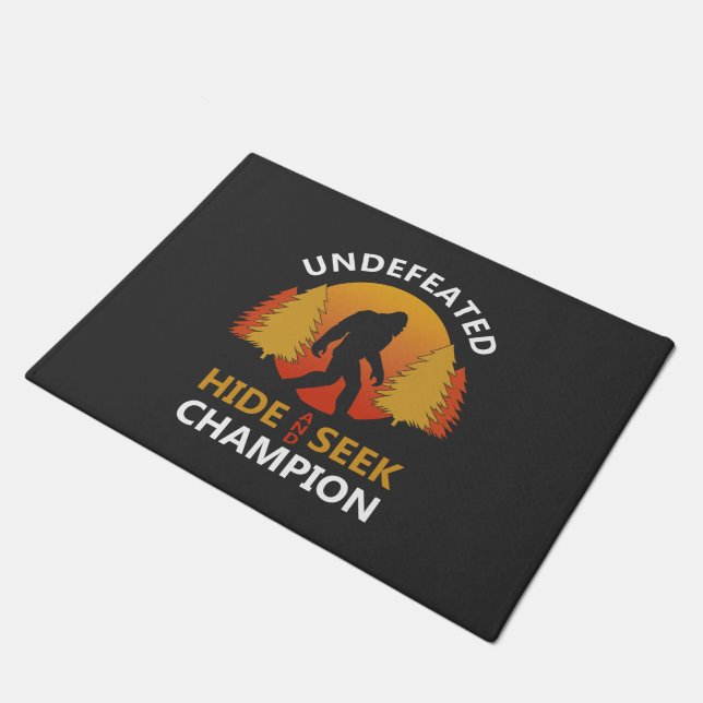 Hide and seek world champion shirt bigfoot is real doormat (Angled)