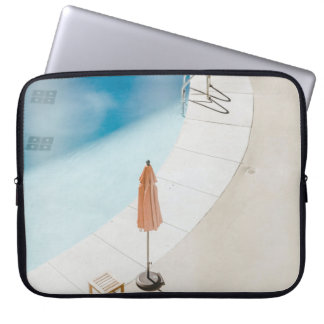 High angle photo of brown umbrella laptop sleeve