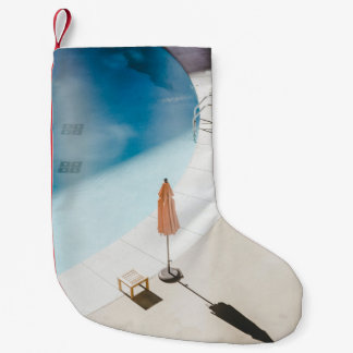 High angle photo of brown umbrella small christmas stocking