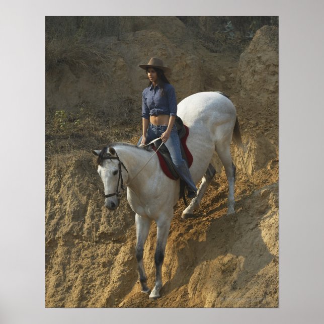 High angle view of a young woman riding a horse poster (Front)