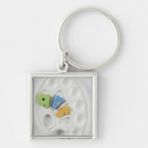 High angle view of alphabets on a palette keychain