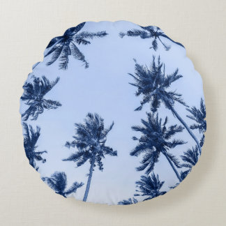 High palm trees, clear blue sky. round pillow