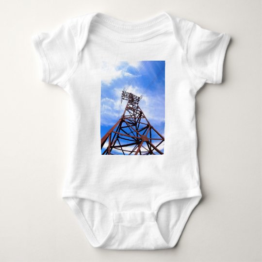 High-voltage tower on blue sky baby bodysuit
