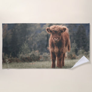 Highland cow calf autumn grass field beach towel