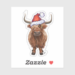 Highland cow in a Santa Hat
