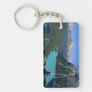 Hiker overlooking turquoise-coloured Lake Keychain