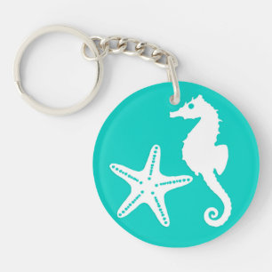 Hippocampe et étoile de mer - blanc sur turquoise