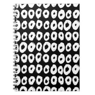 Hipster style pattern with doughnut like shapes in notebook