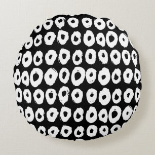 Hipster style pattern with doughnut like shapes in round pillow
