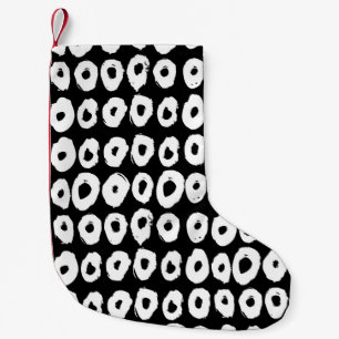 Hipster style pattern with doughnut like shapes in small christmas stocking