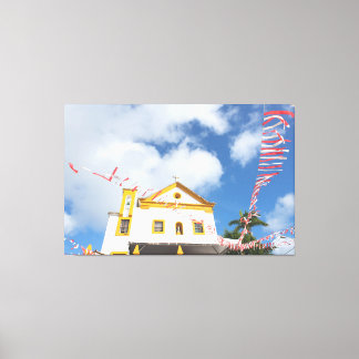 Historic Colonial Church with Festive Banners in S Canvas Print
