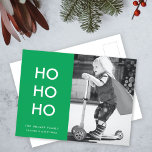 Ho Ho Ho | Bright Green Christmas Cheer Photo Holiday Postcard<br><div class="desc">Simple, stylish "Ho Ho Ho" photo holiday postcard in bright green with a modern minimalist typography in white which can be easily personalized with your own greeting, family name & year for a trendy festive season! The card shows an example image an adorable happy little boy riding a scooter playing...</div>