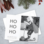 Ho Ho Ho | Minimalist Clean Simple Christmas Photo Holiday Postcard<br><div class="desc">Simple, stylish "Ho Ho Ho" photo holiday postcard in monochrome black & white with a modern minimalist typography in white which can be easily personalized with your own greeting, family name & year for a trendy festive season! The card shows an example image an adorable happy little boy riding a...</div>