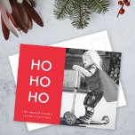 Ho Ho Ho | Red Xmas Photo Fun Modern Minimalist Holiday Postcard<br><div class="desc">Simple, stylish "Ho Ho Ho" photo holiday postcard in bright red with a modern minimalist typography in white which can be easily personalized with your own greeting, family name & year for a trendy festive season! The card shows an example image an adorable happy little boy riding a scooter playing...</div>
