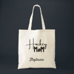 Hockey Mom tote bag calligraphy black<br><div class="desc">Great hockey mom gift to carry all her gear at the rink! 
Colour – Black.
Design Front and Back - "Hockey Mom " in calligraphie   Personalize with  name of the hockey mom.
Designed by Ice Skating Passion. 
Other hockey gifts in the shop - click on the Ice_Skating_Passion name below.</div>