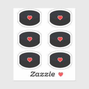Hockey pucks with red heart pack