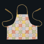HOGWARTS™ QUIDDITCH™ Team Checker Pattern Apron<br><div class="desc">Celebrate the magic of the wizarding world with this charming checkered icon pattern design. Featuring a playful patchwork of house-inspired colors, broomsticks, magical balls, crests, and other wizarding symbols, this all-over print blends classic charm with whimsical detail. The alternating checkerboard layout gives the design a cozy, quilt-like feel, while the...</div>