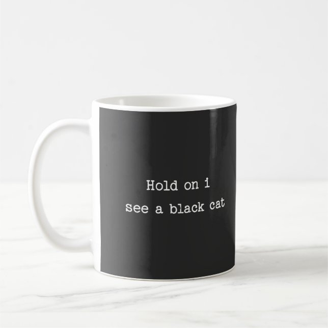 Hold on I see a Black Cat Coffee Mug (Left)