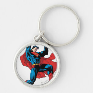 Holding up a heavy object keychain